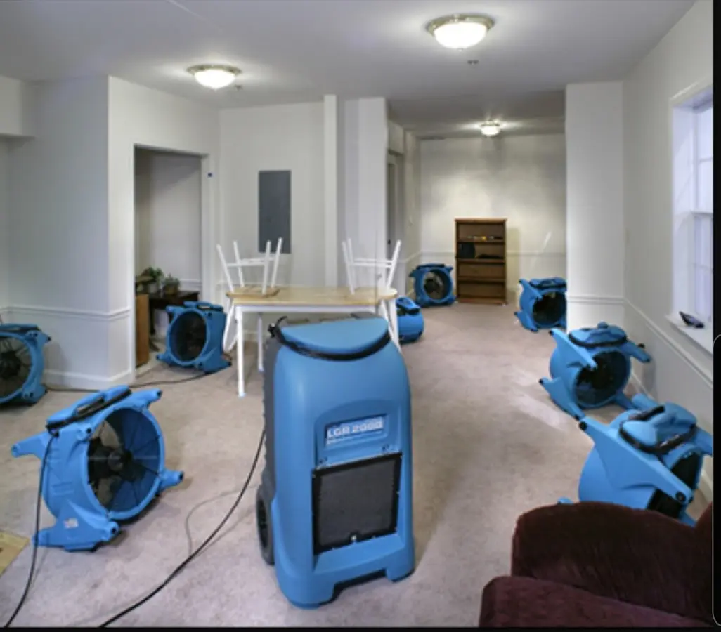 Air movers and dehumidifier setup for Water Damage Restoration in George Mason