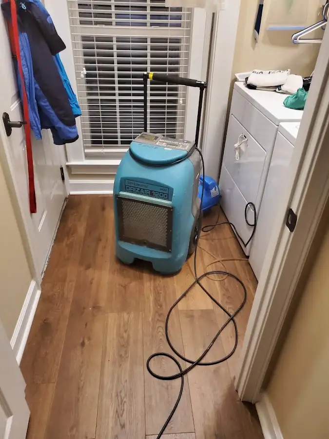 Commercial dehumidifier deployed for Flood Damage Cleanup in George Mason